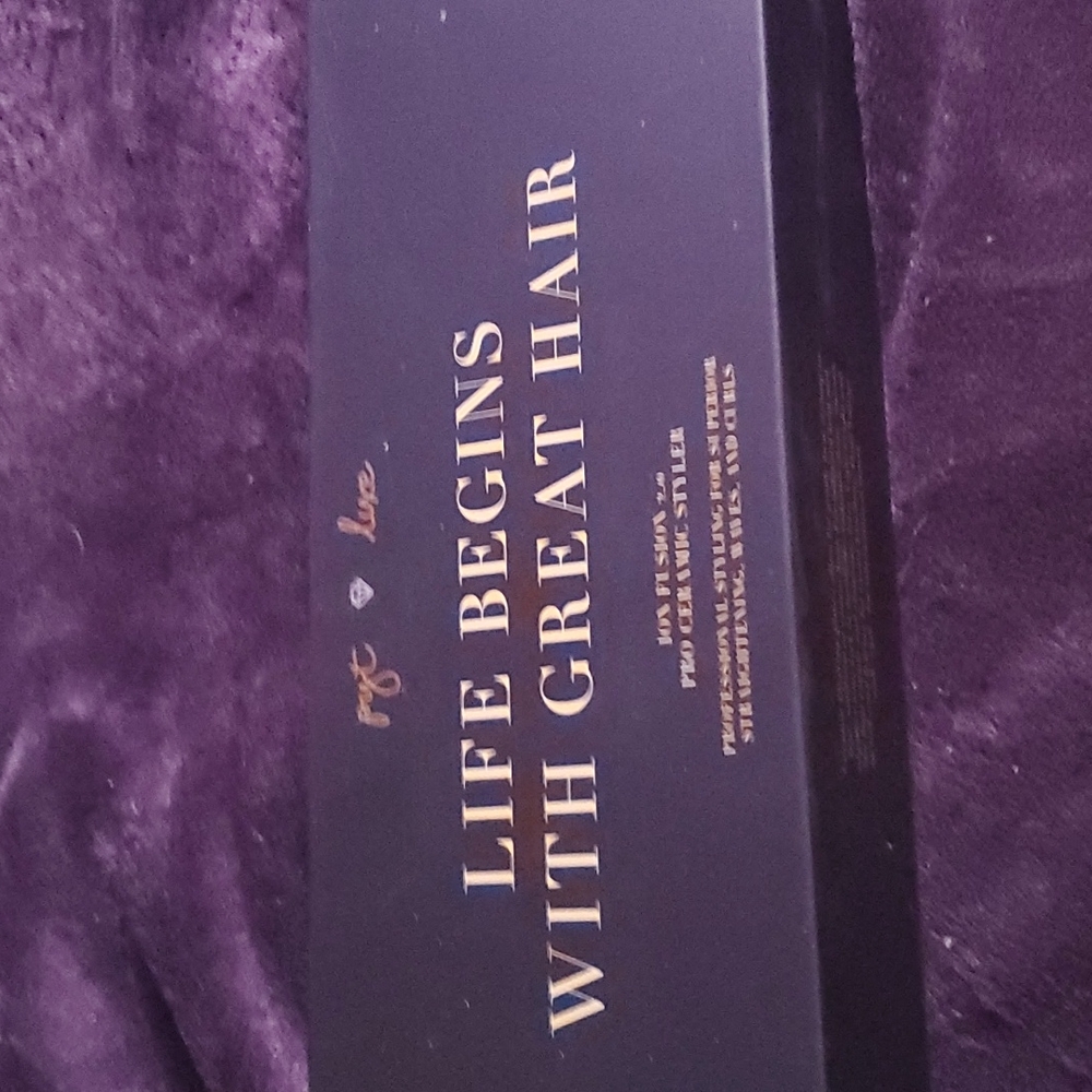 PYT hair straightener, still in box, never used.